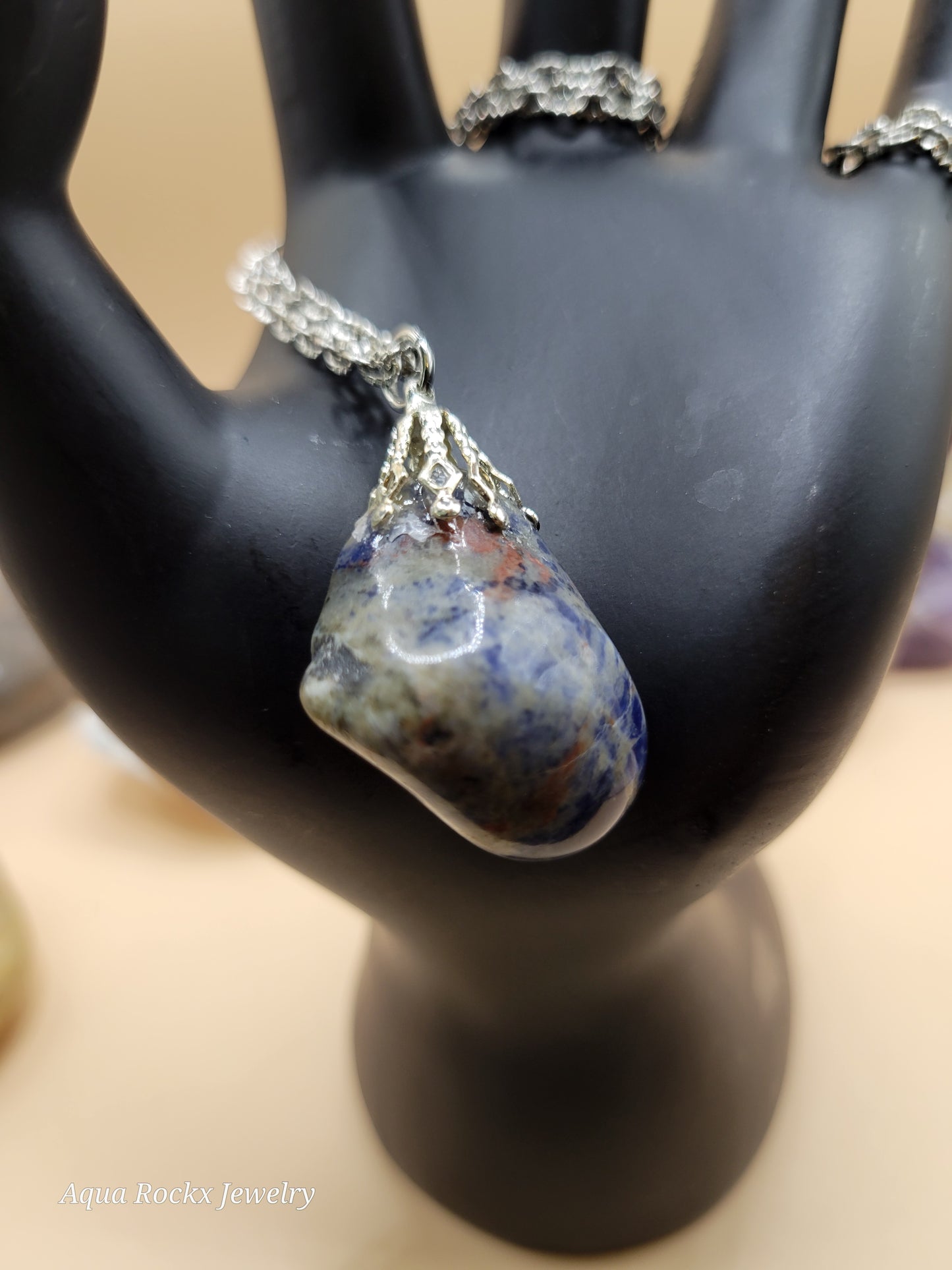 Sodalite Pendant on Hand