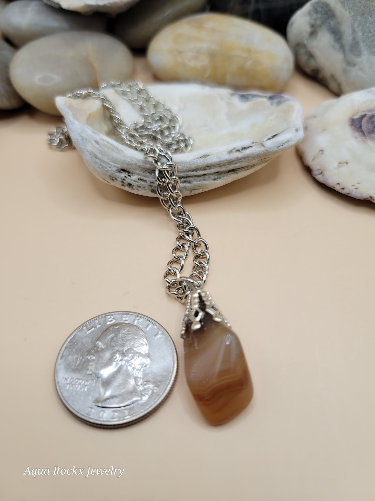 orange quartz pendant with silver chain