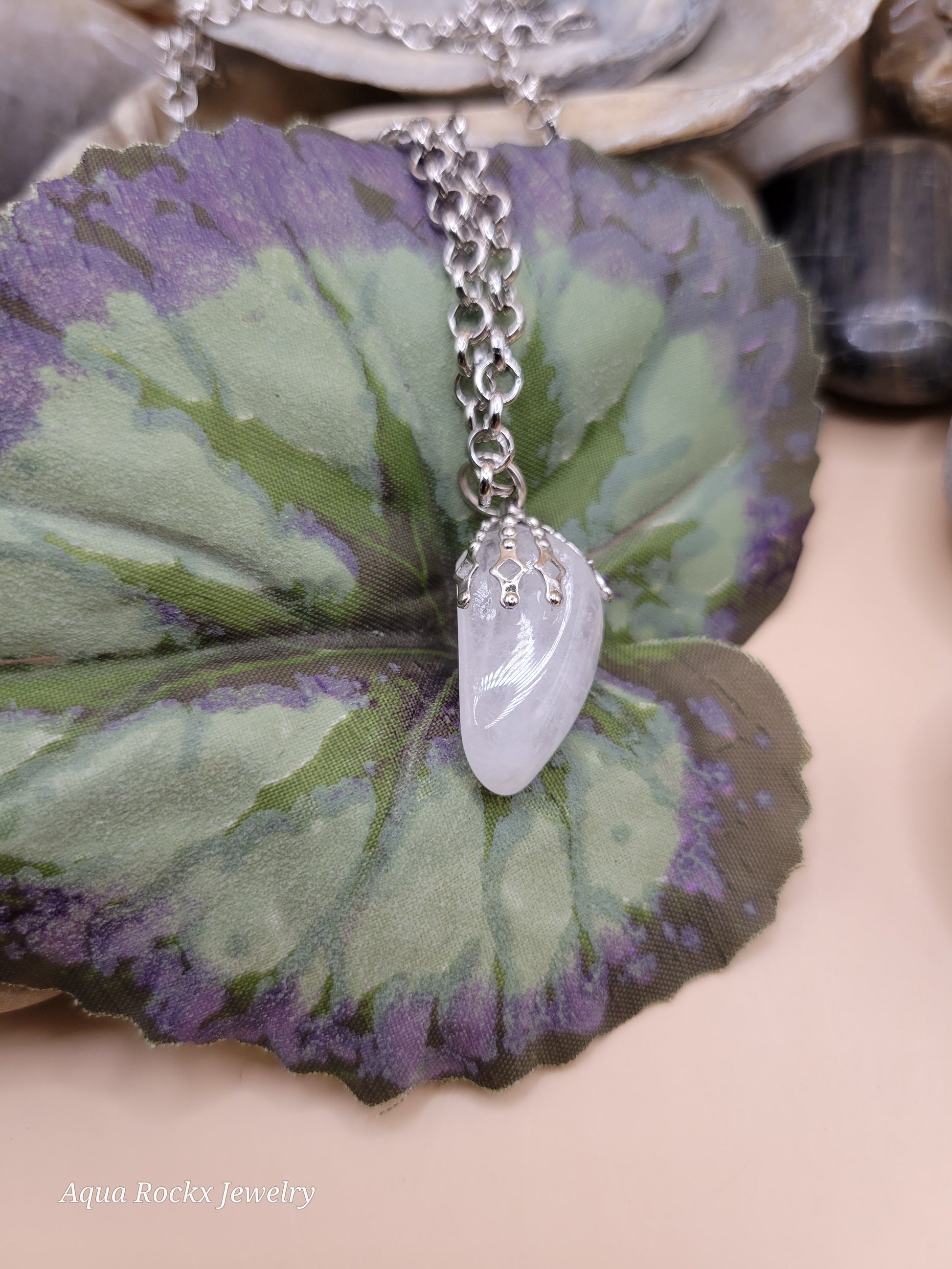 white quartz pendant on silver chain