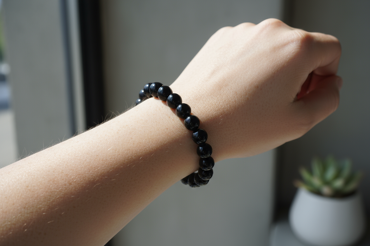 adult female wearing my black onyx stretch bracelet